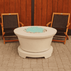 Round Granada natural gas fire pit table with modern concrete finish